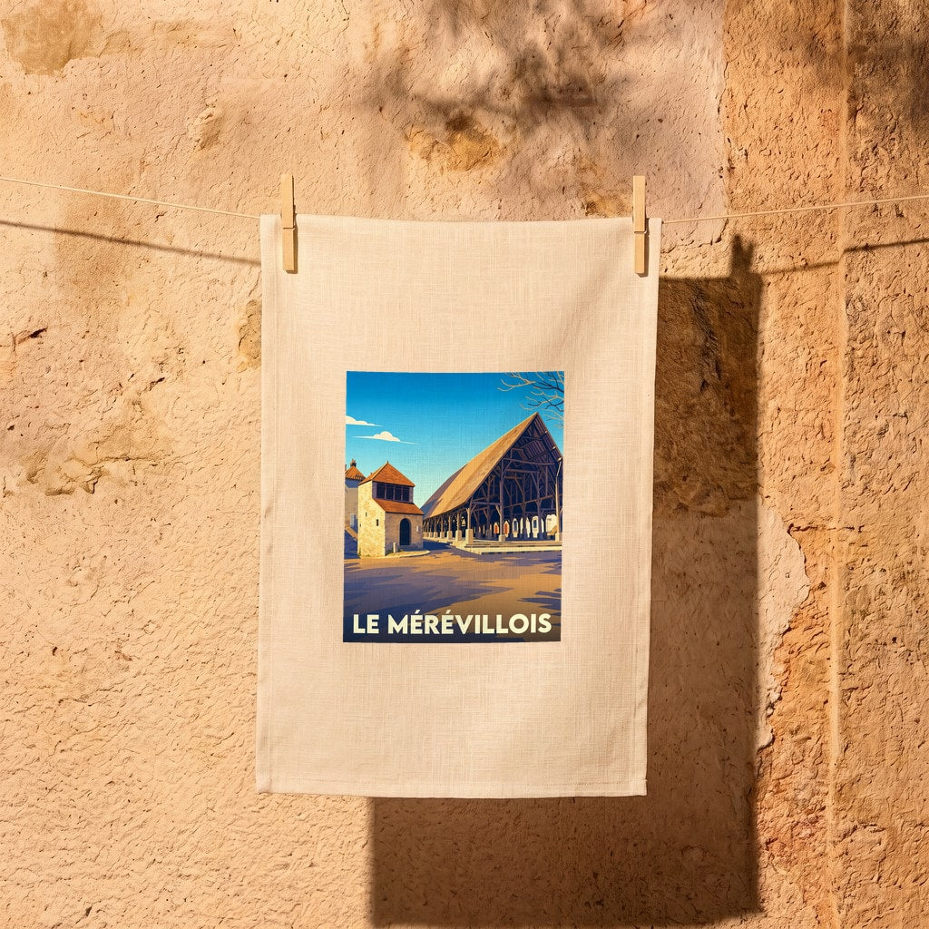 Torchon souvenir de la ville de Le Mérévillois avec une illustration stylisée de ses halles historiques.