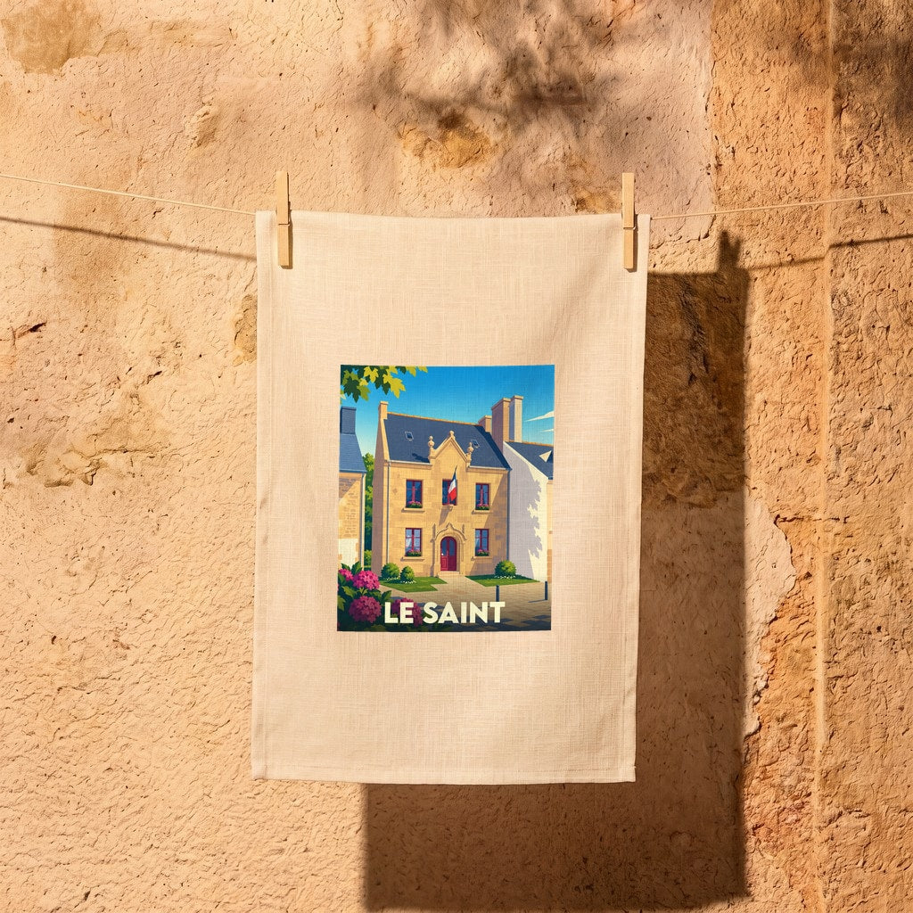 Torchon souvenir de la ville de Le Saint avec une illustration stylisée d'un bâtiment typique.