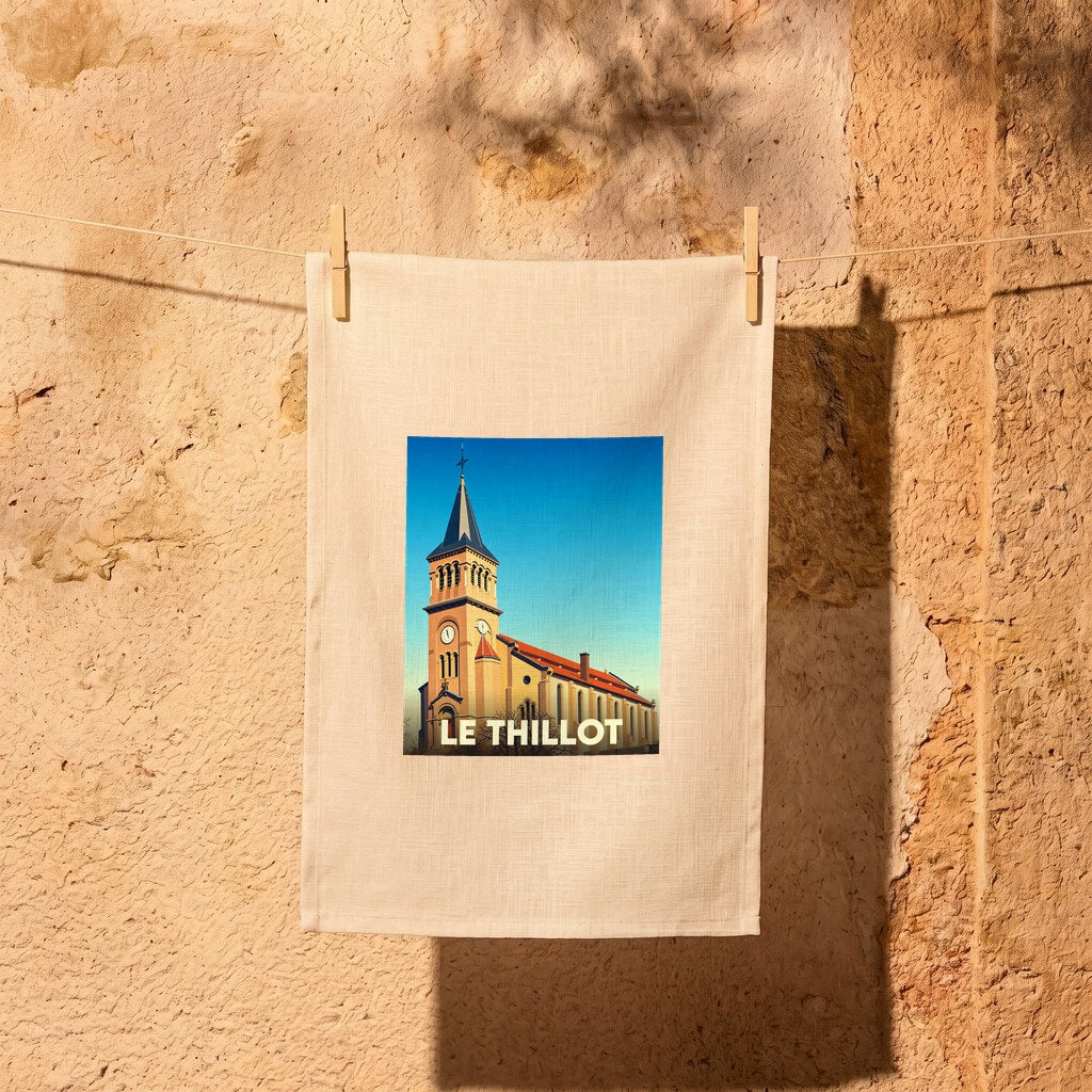 Torchon souvenir de la ville de Le Thillot illustré d'une église de style vintage.
