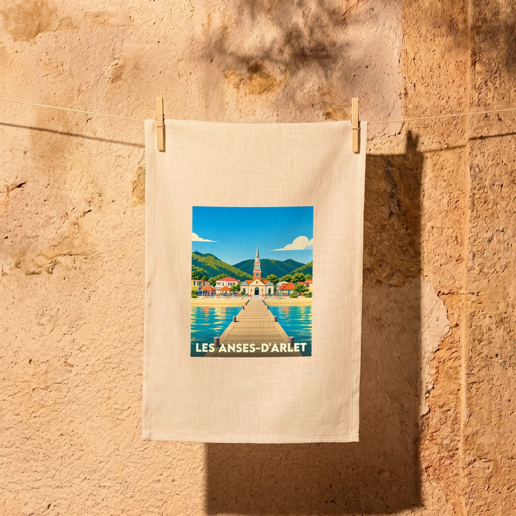 Torchon souvenir de la ville de Les Anses-d'Arlet avec une illustration stylisée.