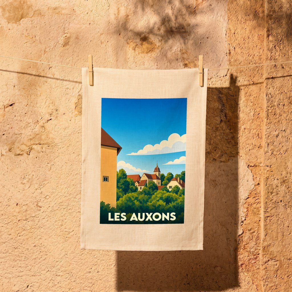 Torchon souvenir de la ville de Les Auxons avec une illustration stylisée.