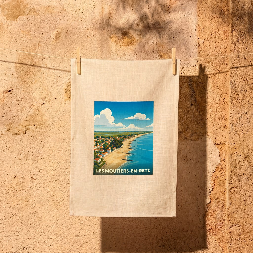 Torchon souvenir de la ville de Les Moutiers-en-Retz avec une illustration stylisée de sa côte.