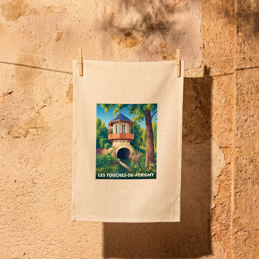 Torchon souvenir de Les Touches-de-Périgny avec une illustration stylisée d'un pavillon surplombant un cours d'eau.