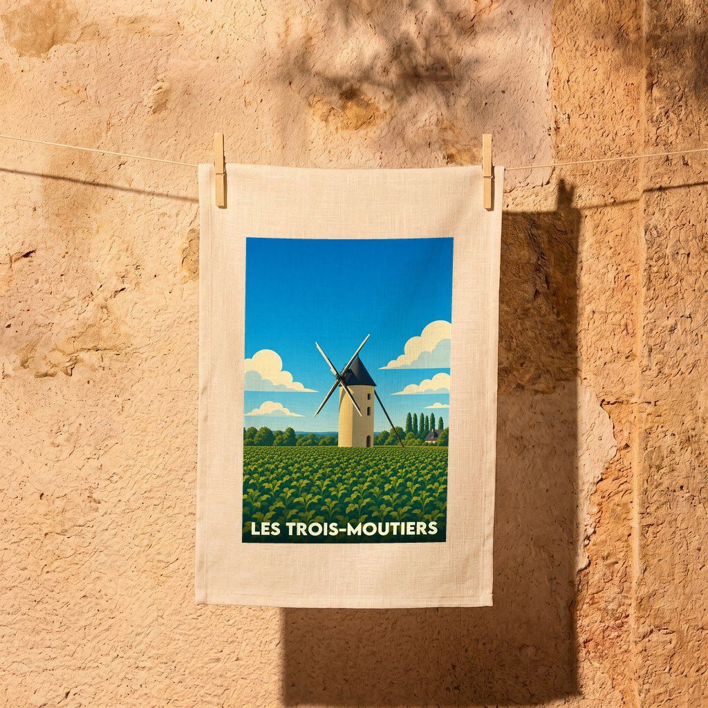 Torchon souvenir de la ville de Les Trois-Moutiers avec une illustration stylisée représentant un moulin.