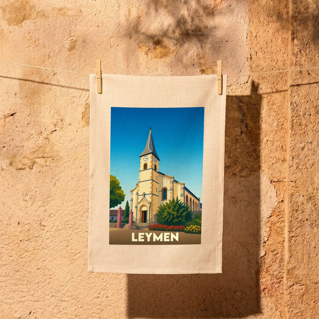 Torchon souvenir de la ville de Leymen avec une illustration stylisée d'une église sous un ciel bleu.