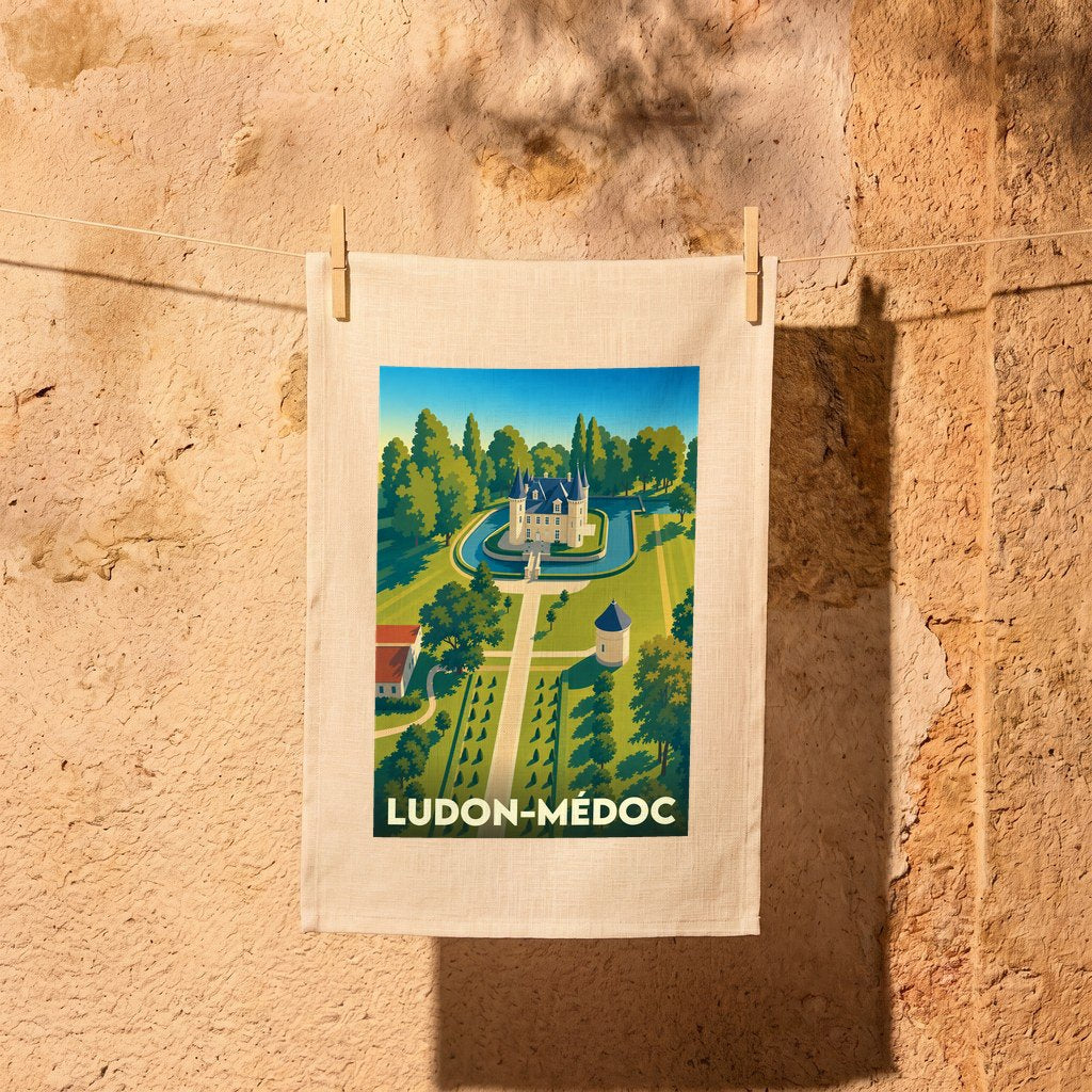 Torchon souvenir de la ville de Ludon-Médoc avec une illustration stylisée d'un château.