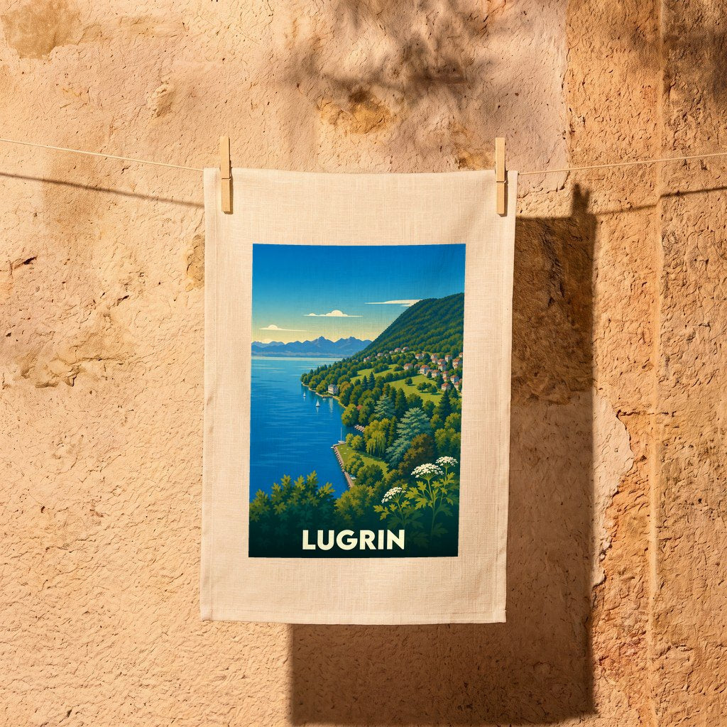Torchon souvenir de la ville de Lugrin avec une illustration stylisée d'un paysage de lac et de montagnes.