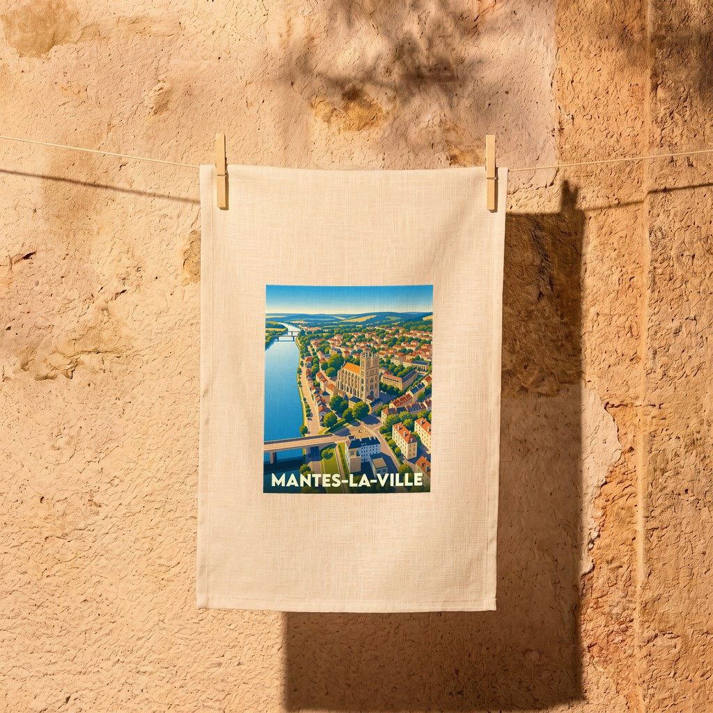 Torchon souvenir de la ville de Mantes-la-Ville avec une illustration panoramique stylisée.