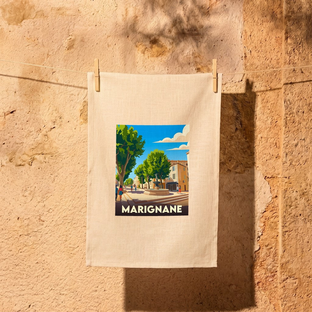 Torchon souvenir de la ville de Marignane avec une illustration stylisée.
