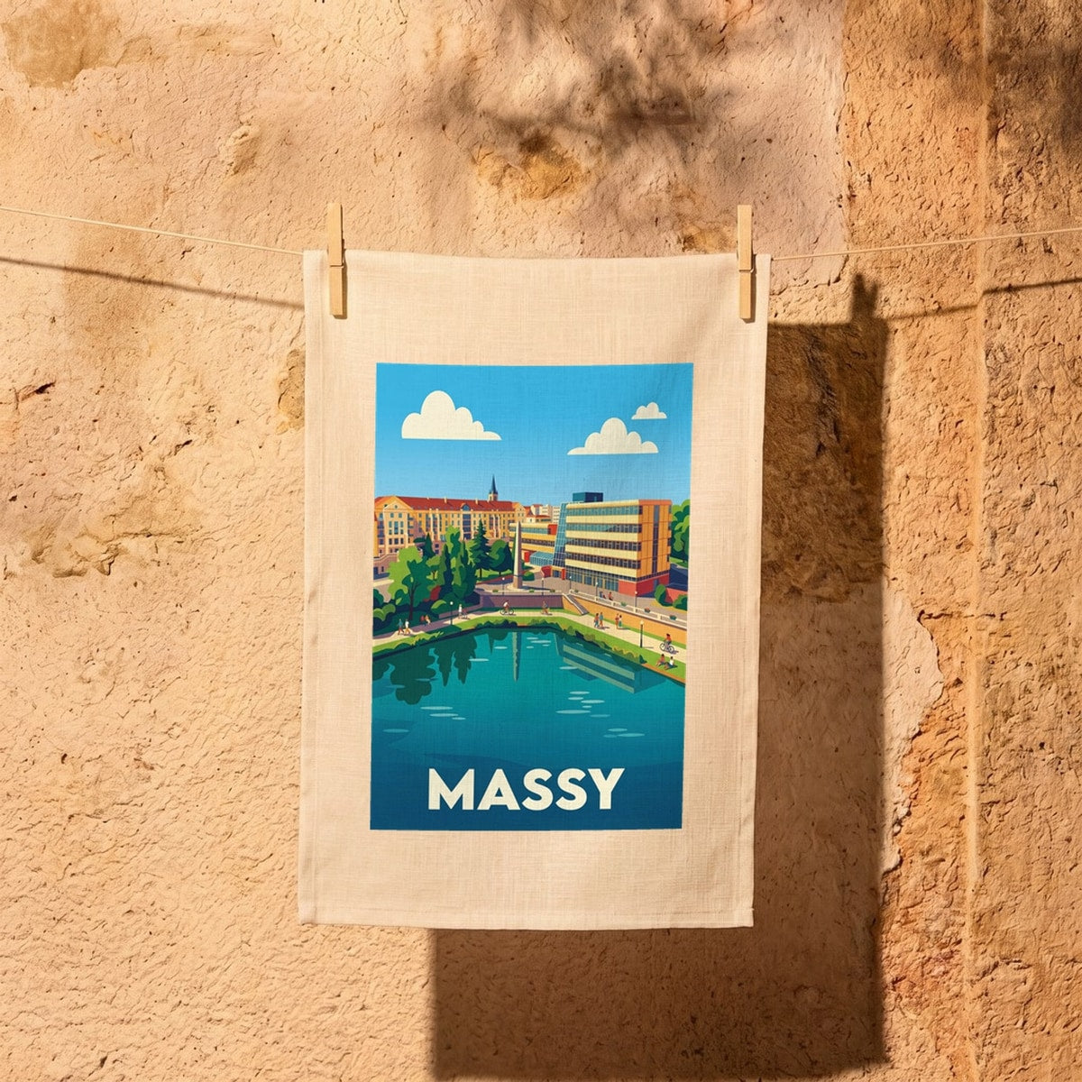 Torchon souvenir de la ville de Massy avec une illustration stylisée et colorée.