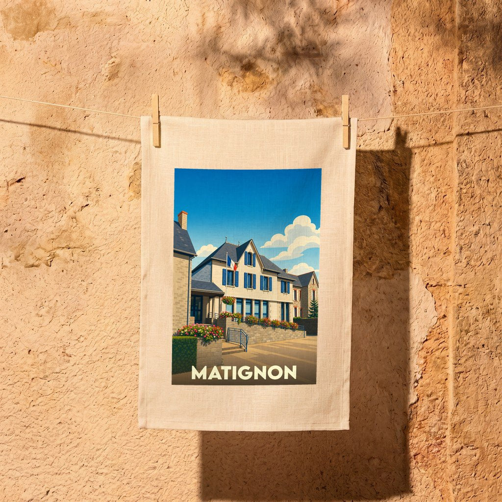 Torchon souvenir de la ville de Matignon avec une illustration stylisée.