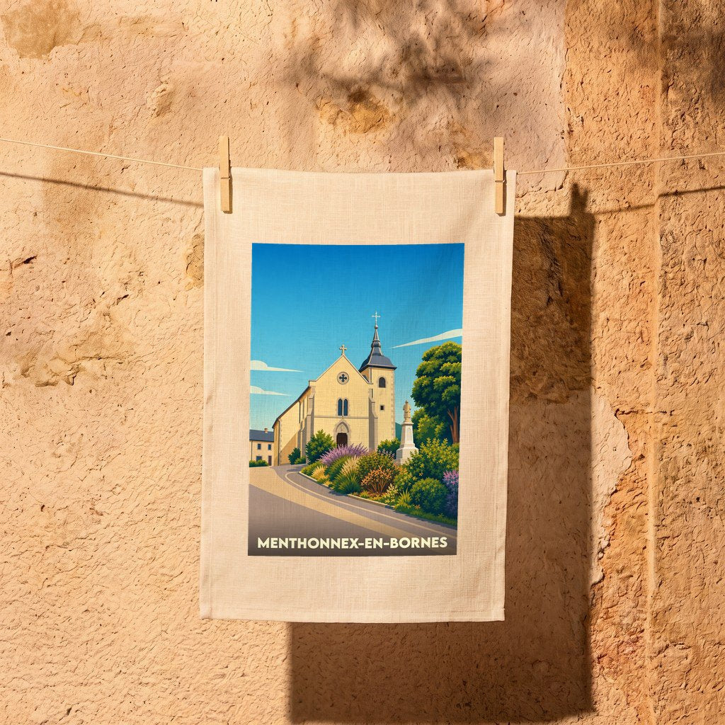 Torchon souvenir de la ville de Menthonnex-en-Bornes avec une illustration stylisée de son église.