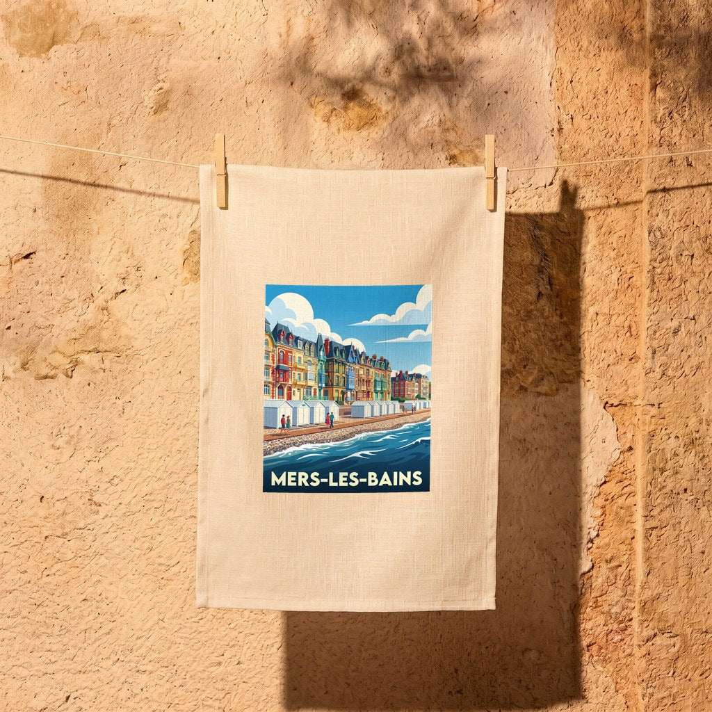 Torchon souvenir de la ville de Mers-les-Bains avec une illustration stylisée de son front de mer et de ses villas colorées.