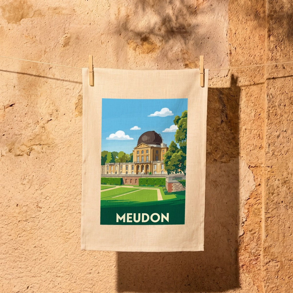 Torchon souvenir de la ville de Meudon avec une illustration stylisée.