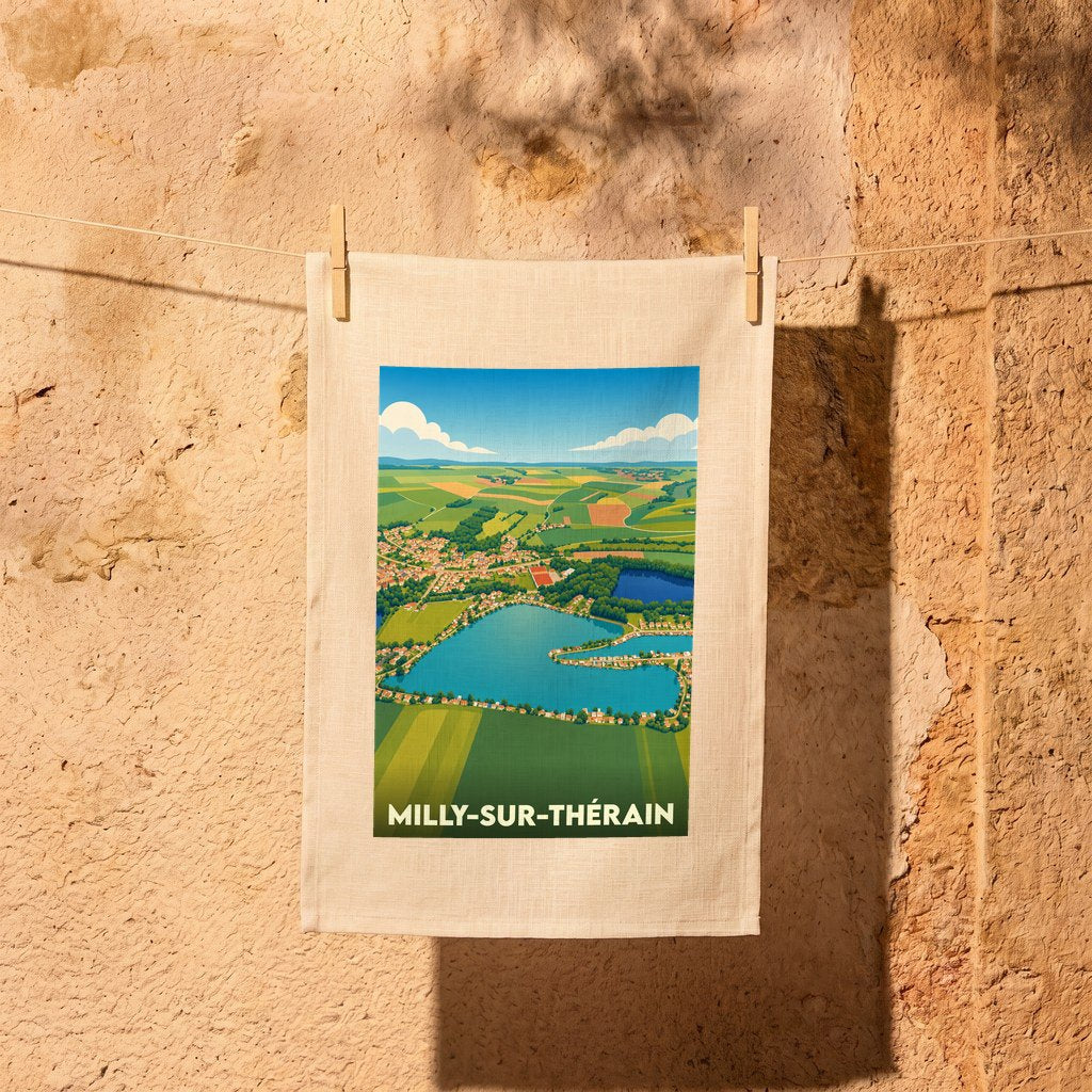 Torchon souvenir de la ville de Milly-sur-Thérain avec une illustration paysagère stylisée.