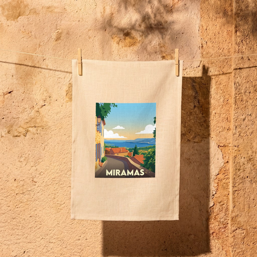 Torchon souvenir de la ville de Miramas avec une illustration stylisée.