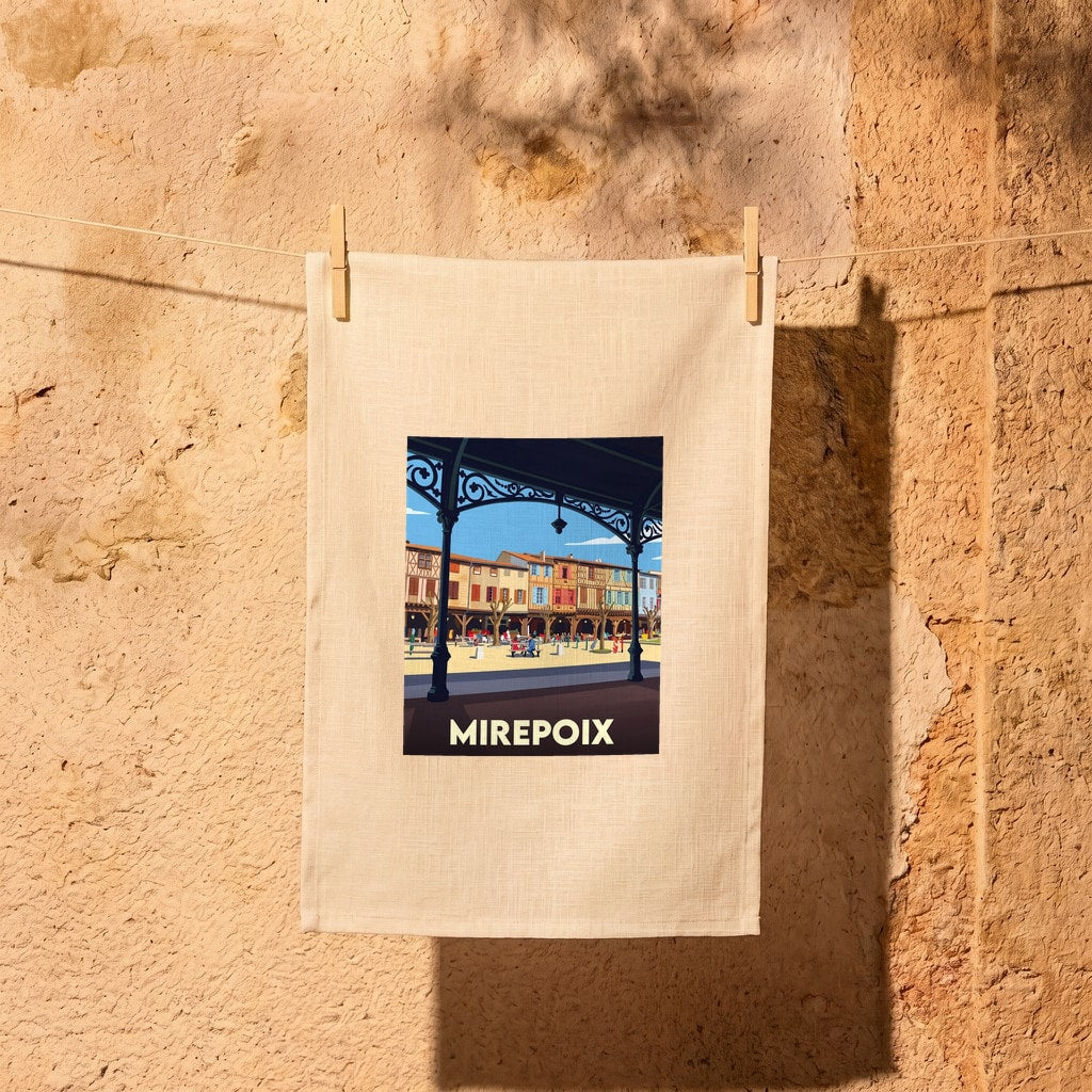 Torchon souvenir de la ville de Mirepoix avec une illustration stylisée de sa place médiévale.