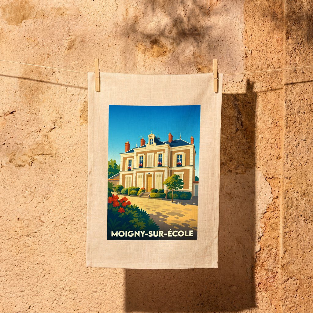 Torchon souvenir de la ville de Moigny-sur-École avec une illustration stylisée d'une demeure bourgeoise.
