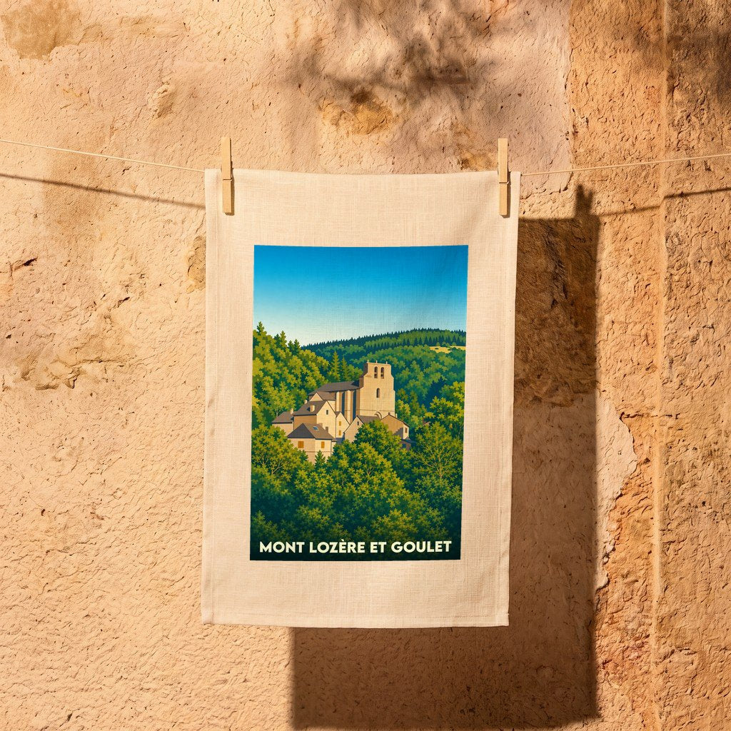 Torchon souvenir de Mont Lozère et Goulet avec une illustration stylisée de son église et de son village nichés dans la forêt.