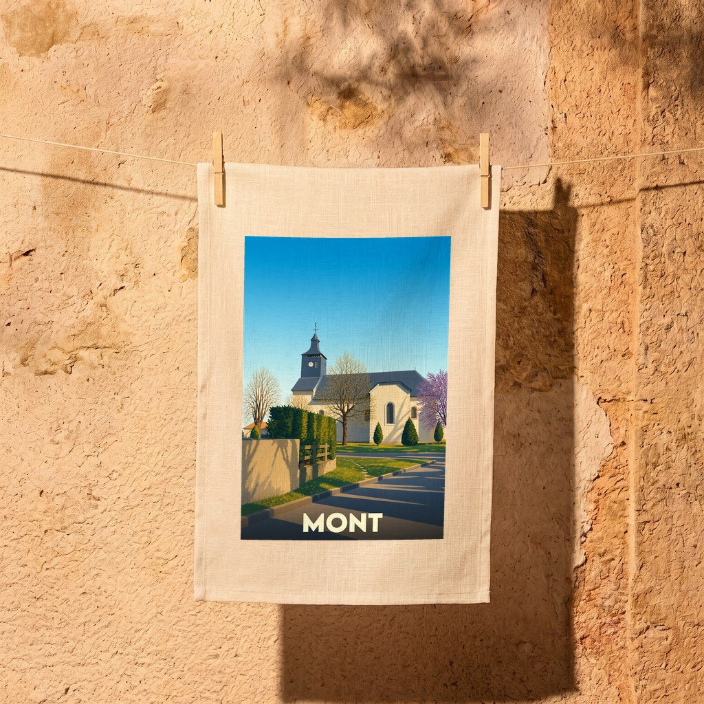 Torchon souvenir de la ville de Mont illustré d'un paysage urbain stylisé avec son église.