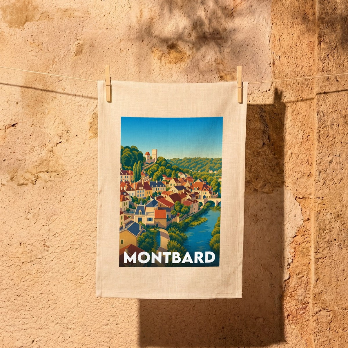 Torchon souvenir de la ville de Montbard avec une illustration stylisée.