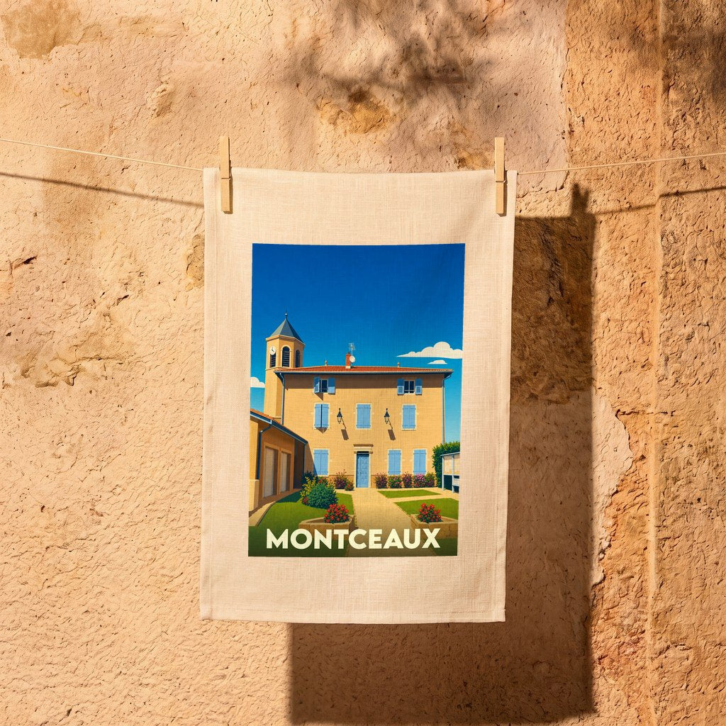 Torchon souvenir de la ville de Montceaux avec une illustration stylisée d'une bâtisse provençale.