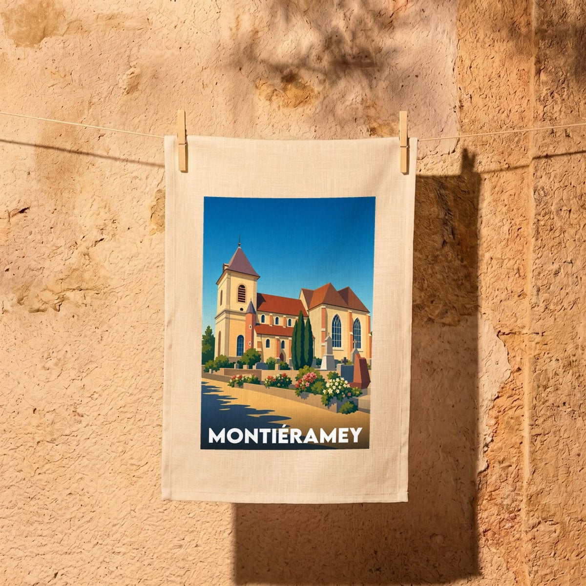 Torchon souvenir de la ville de Montiéramey avec une illustration stylisée.