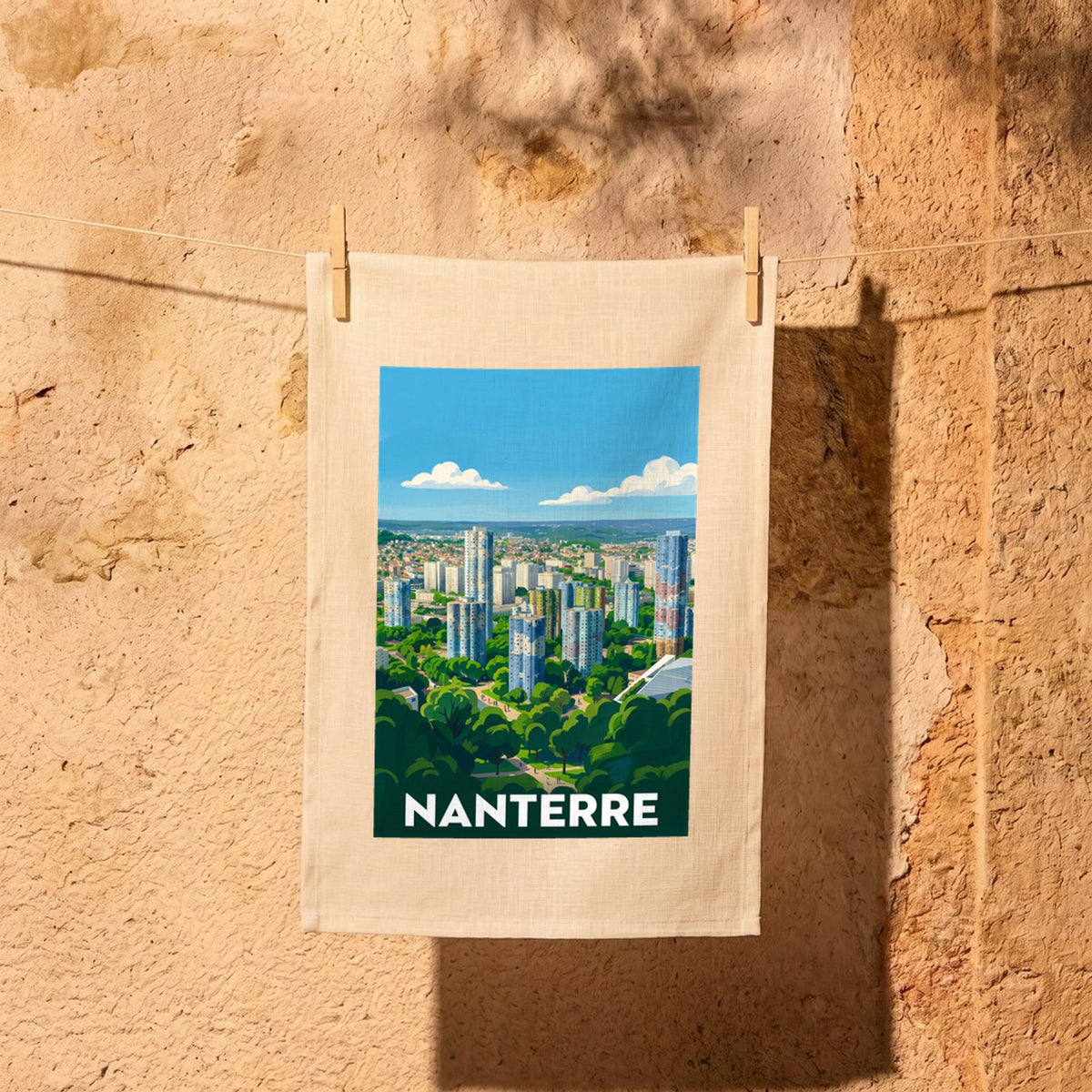 Torchon souvenir de la ville de Nanterre avec une illustration stylisée de son paysage urbain.