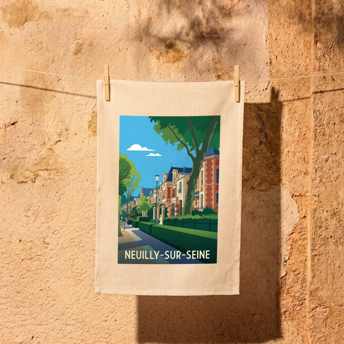 Torchon souvenir de la ville de Neuilly-sur-Seine avec une illustration stylisée.