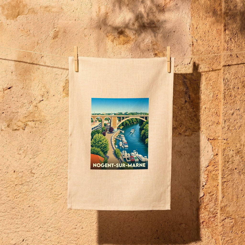 Torchon souvenir de la ville de Nogent-sur-Marne illustré d'un paysage stylisé des bords de Marne et du viaduc.
