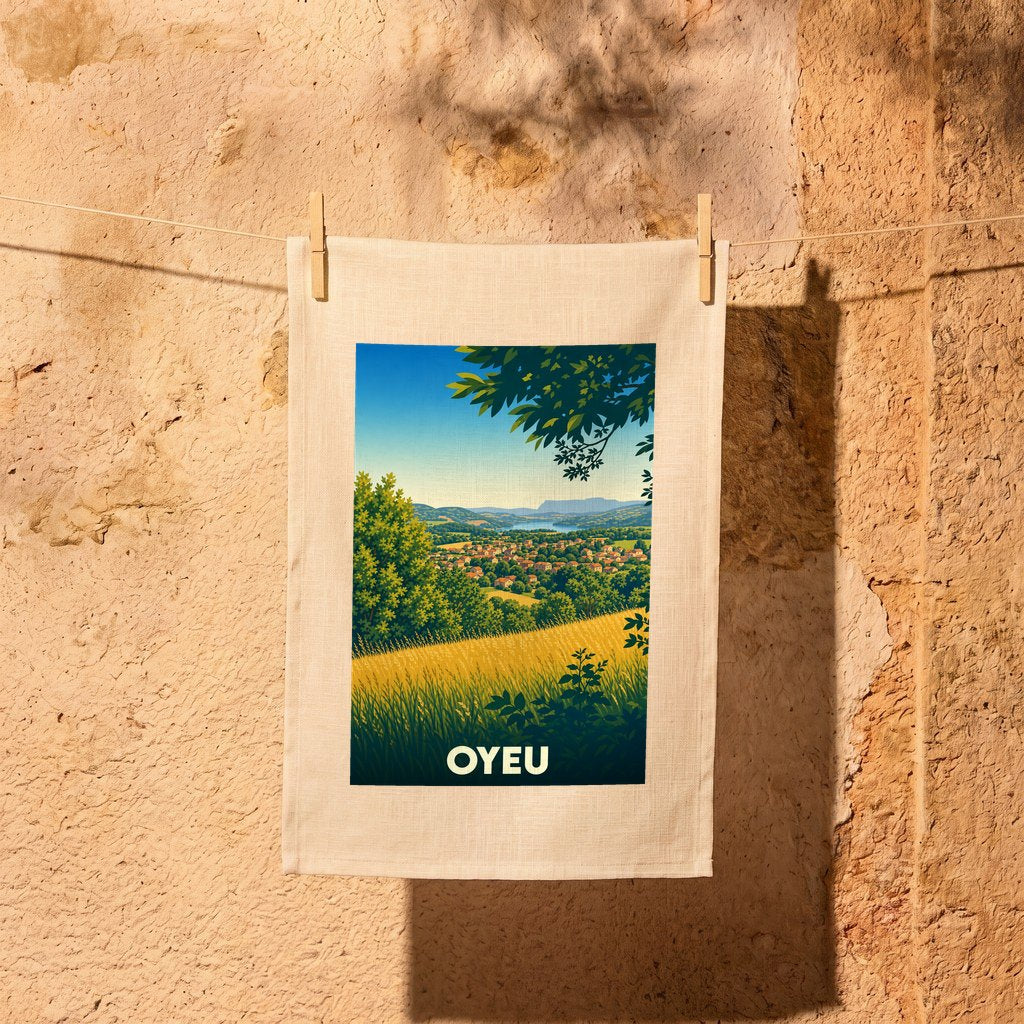 Torchon souvenir de la ville d'Oyeu avec une illustration stylisée d'un paysage de campagne vallonné.