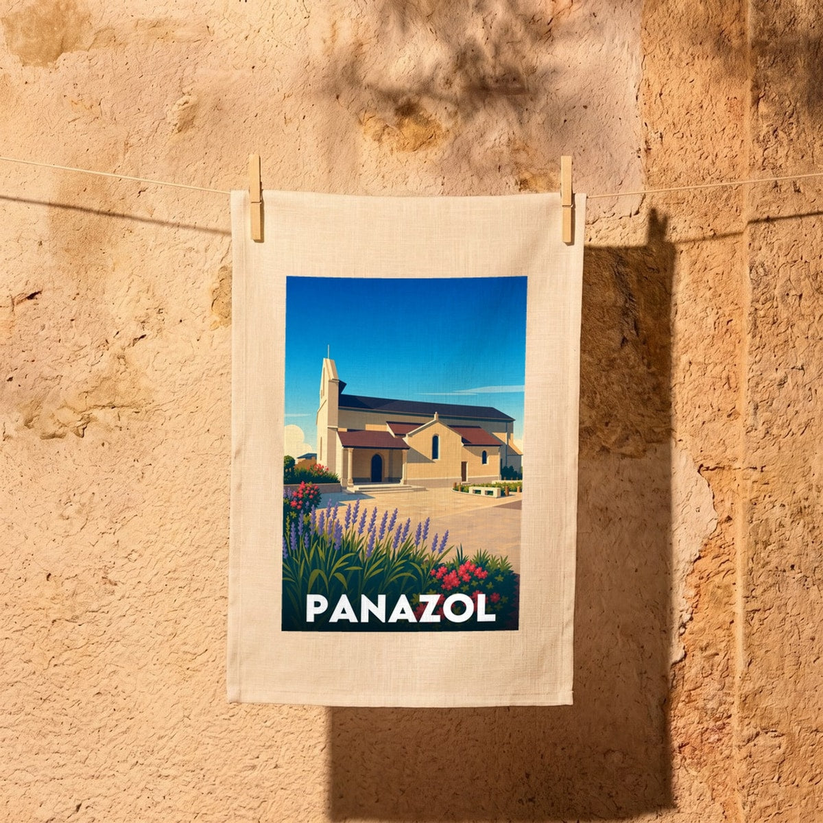 Torchon souvenir de la ville de Panazol avec une illustration stylisée de son église.