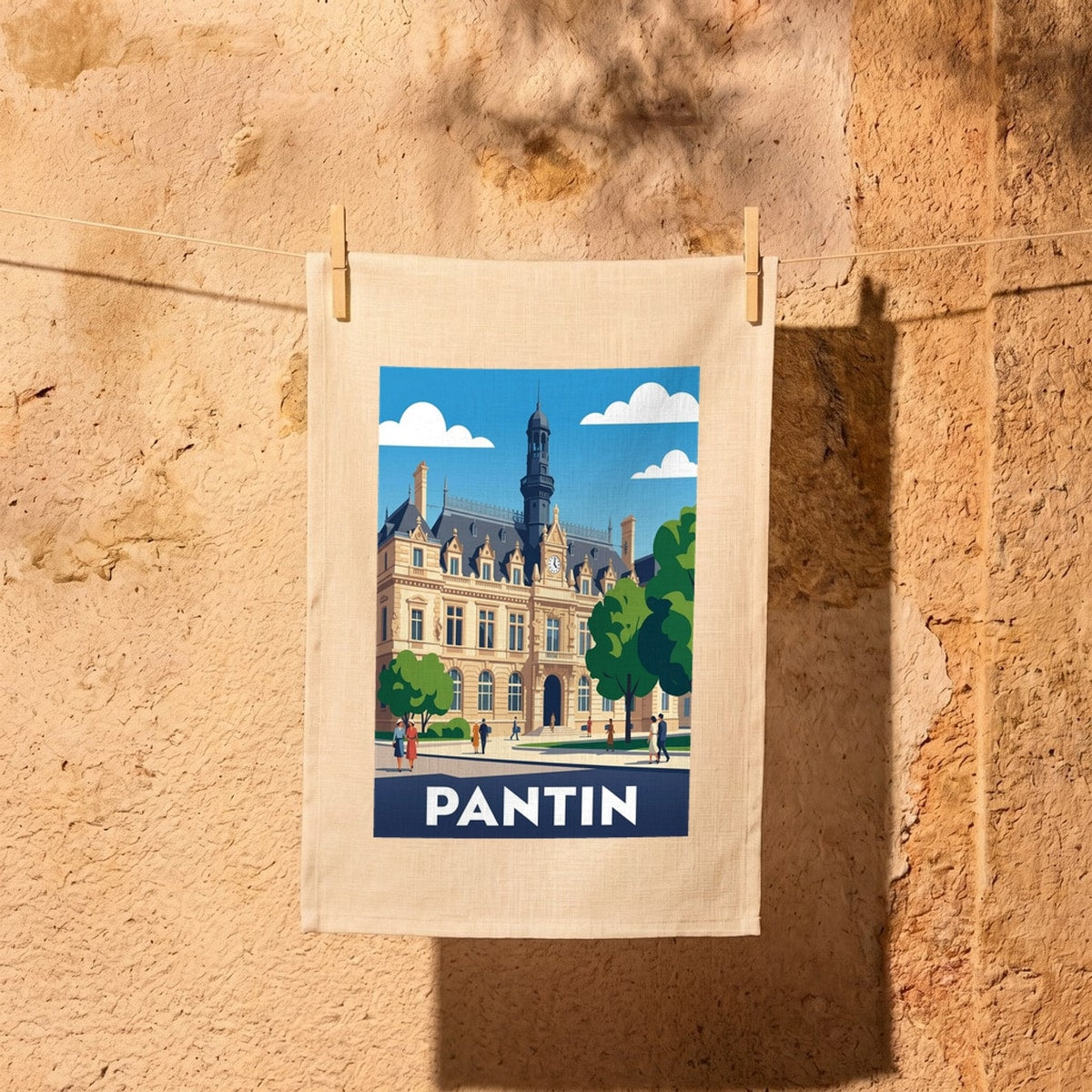 Torchon souvenir de la ville de Pantin avec une illustration stylisée de son hôtel de ville.