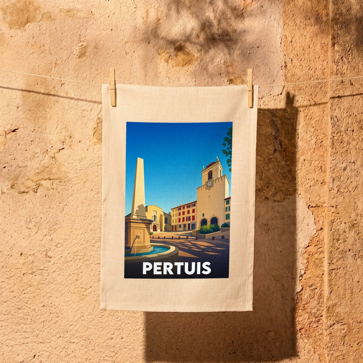 Torchon souvenir de la ville de Pertuis avec une illustration stylisée.
