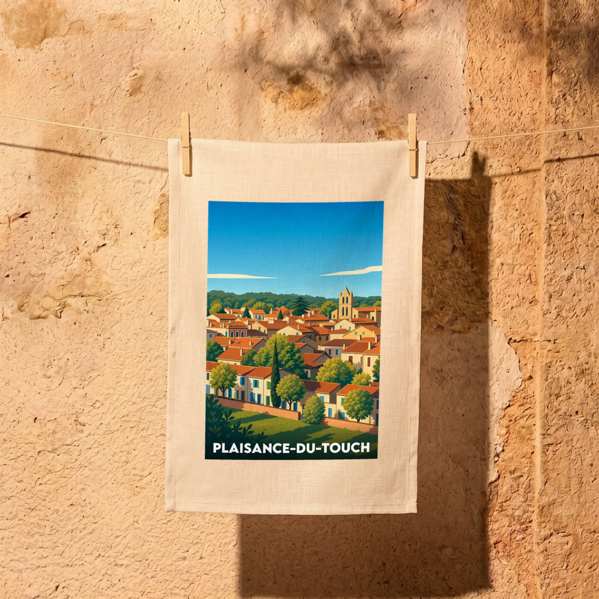 Torchon souvenir de la ville de Plaisance-du-Touch avec une illustration stylisée.