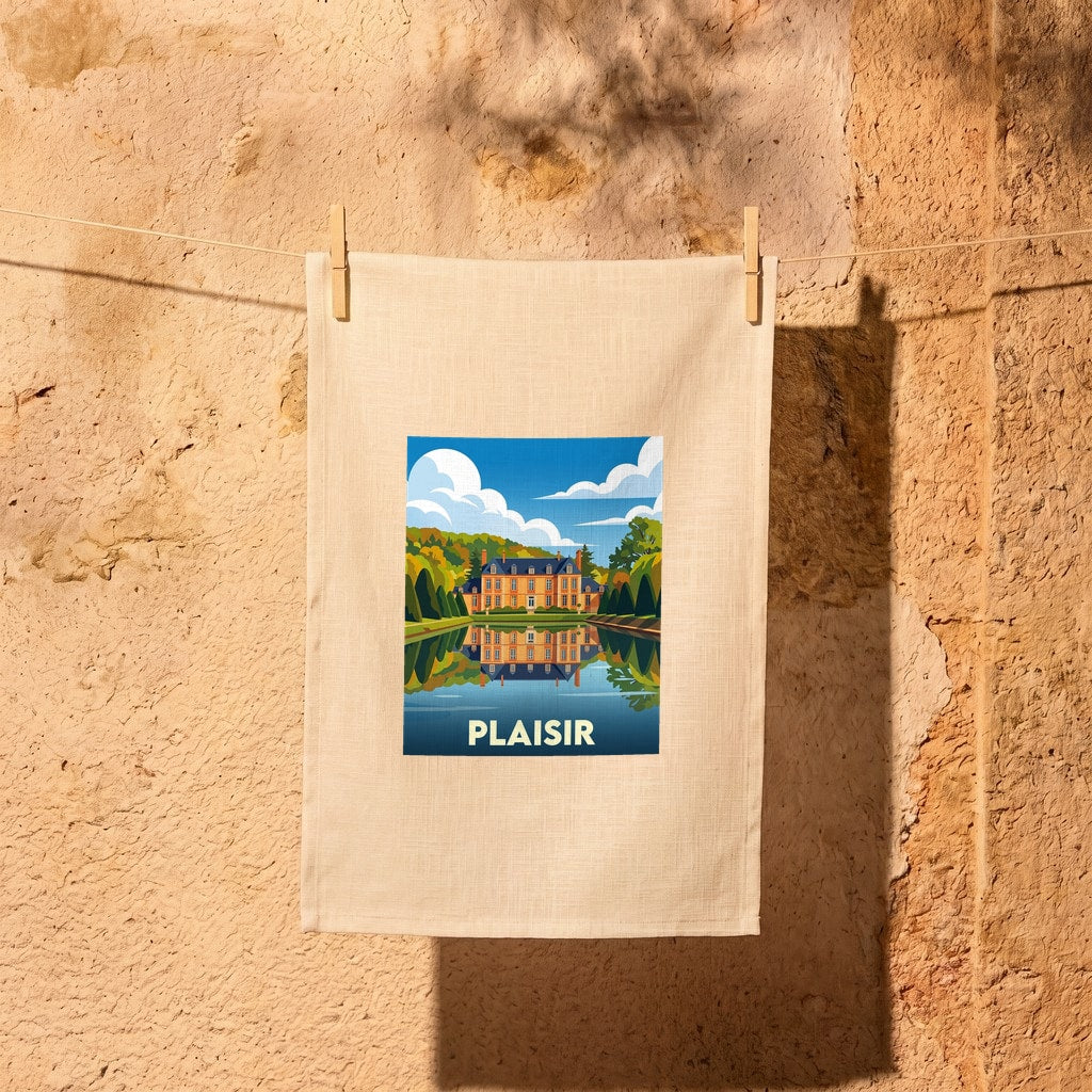 Torchon souvenir de la ville de Plaisir avec une illustration stylisée d'un château et de son reflet.