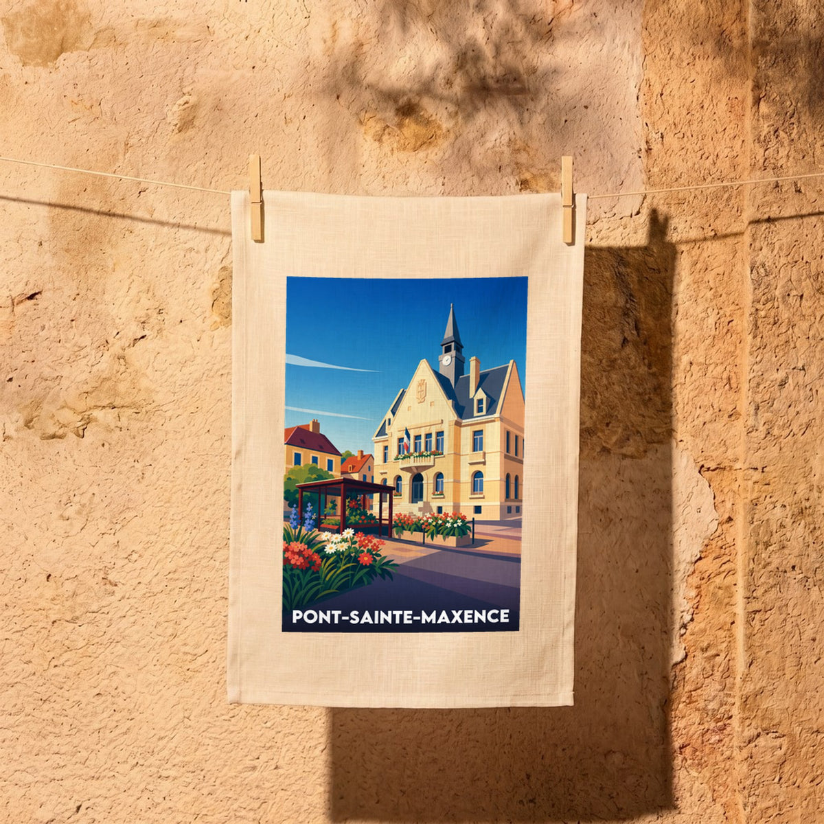 Torchon souvenir de la ville de Pont-Sainte-Maxence avec une illustration stylisée de l'hôtel de ville.
