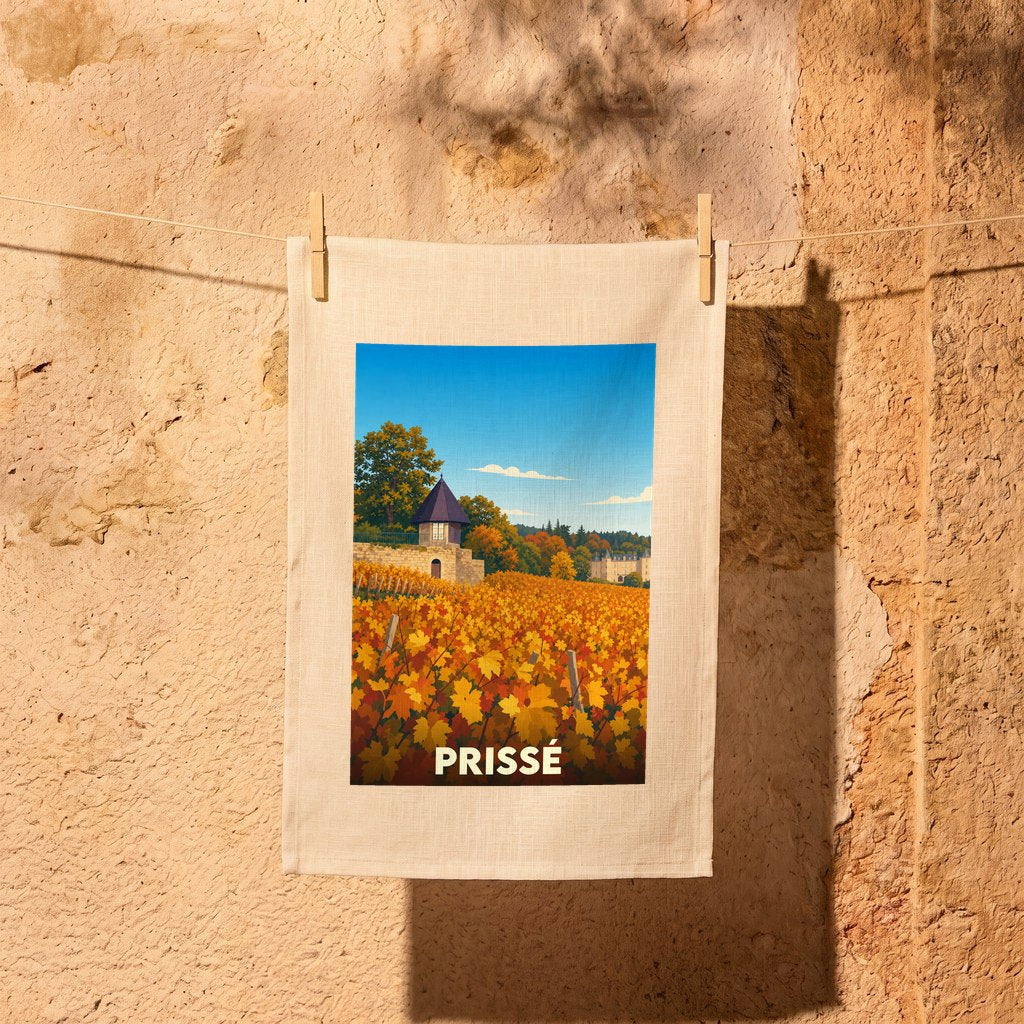 Torchon souvenir de la ville de Prissé illustrant un paysage de vignes aux couleurs automnales.