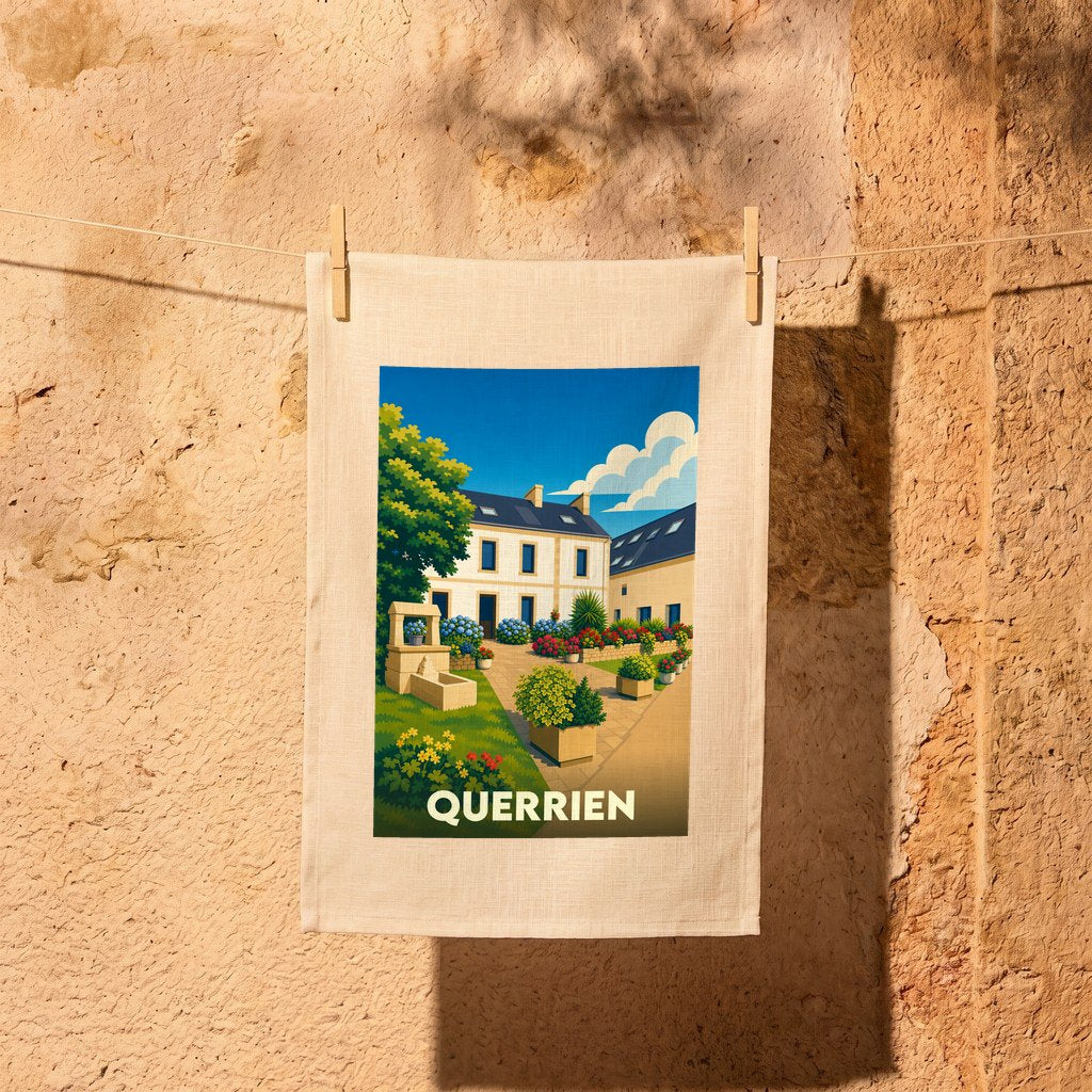 Torchon souvenir de la ville de Querrien illustré par un paysage de village fleuri au style vintage.