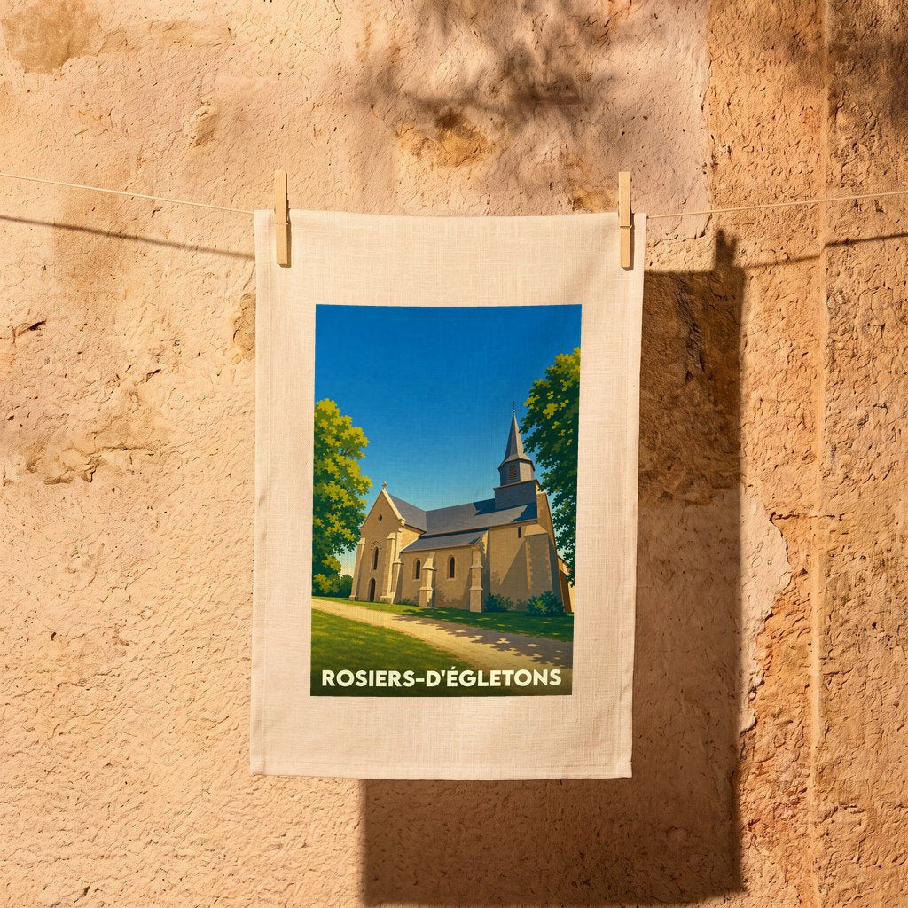 Torchon souvenir de Rosiers-d'Égletons illustrant son église sous un ciel bleu azur.