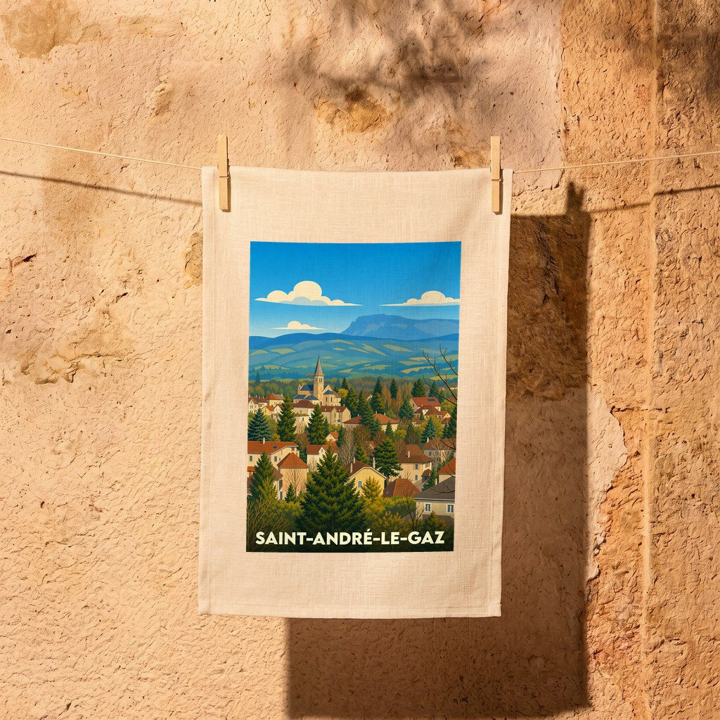 Torchon souvenir de la ville de Saint-André-le-Gaz avec une illustration stylisée de son paysage et de ses montagnes.