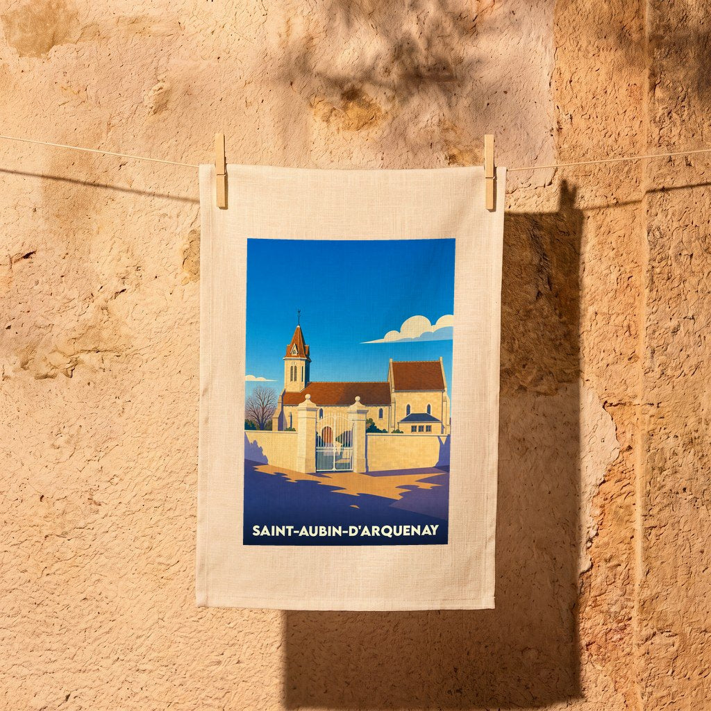 Torchon souvenir de la ville de Saint-Aubin-d'Arquenay avec une illustration stylisée de son église.