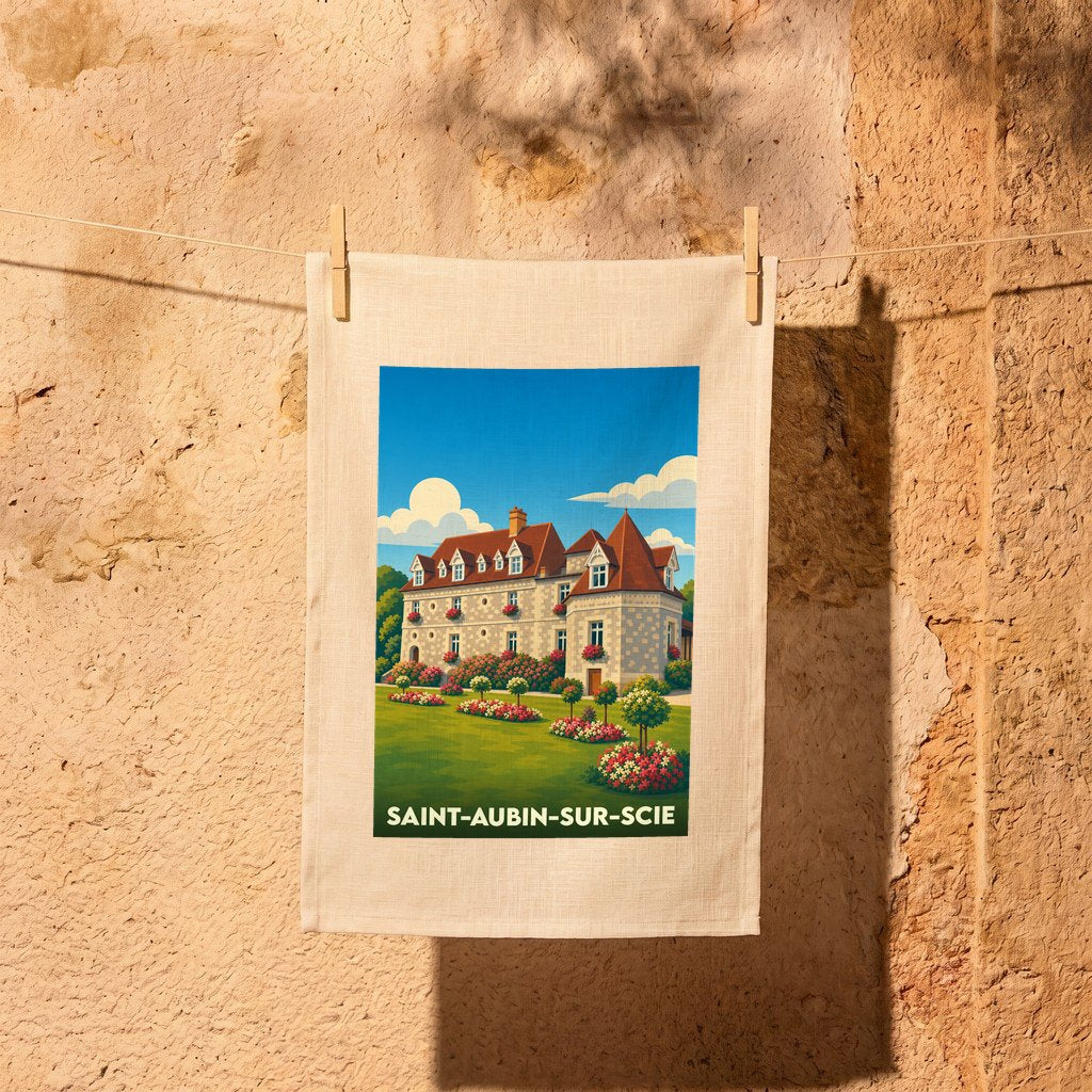 Torchon souvenir de Saint-Aubin-sur-Scie orné d'une illustration stylisée d'un manoir normand fleuri.