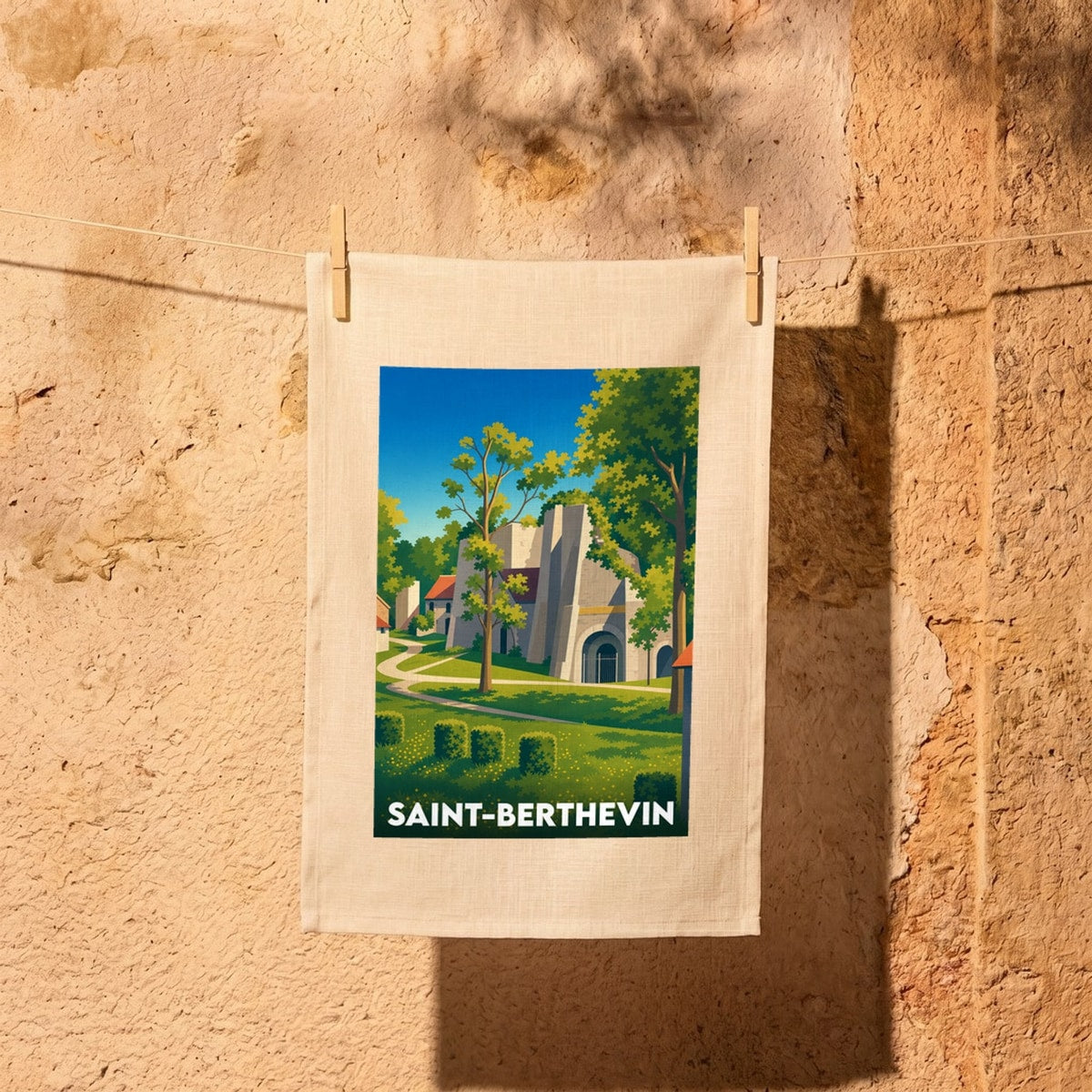 Torchon souvenir de la ville de Saint-Berthevin avec une illustration stylisée de ses anciens fours à chaux.