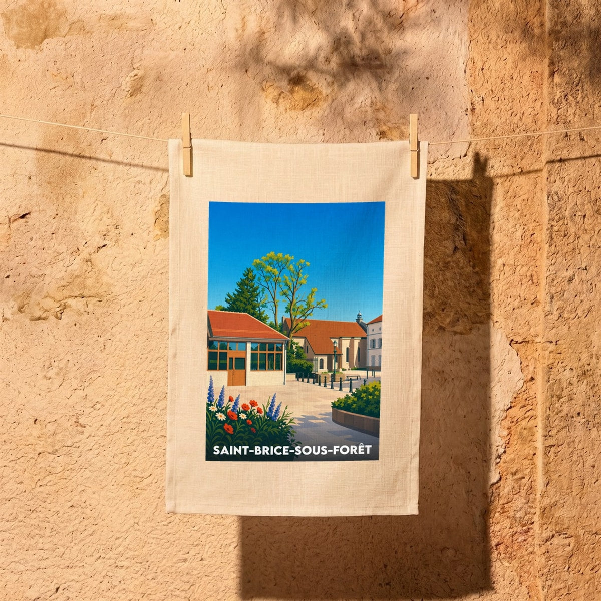 Torchon souvenir de la ville de Saint-Brice-sous-Forêt avec une illustration stylisée.