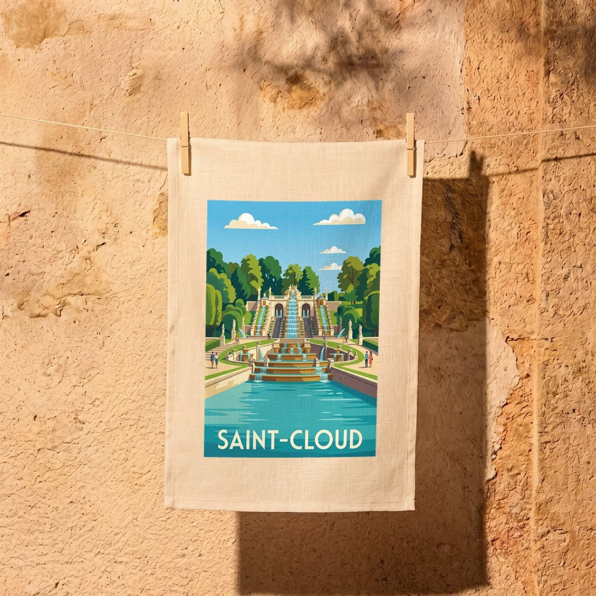 Torchon souvenir de la ville de Saint-Cloud avec une illustration stylisée de ses jardins et fontaines.