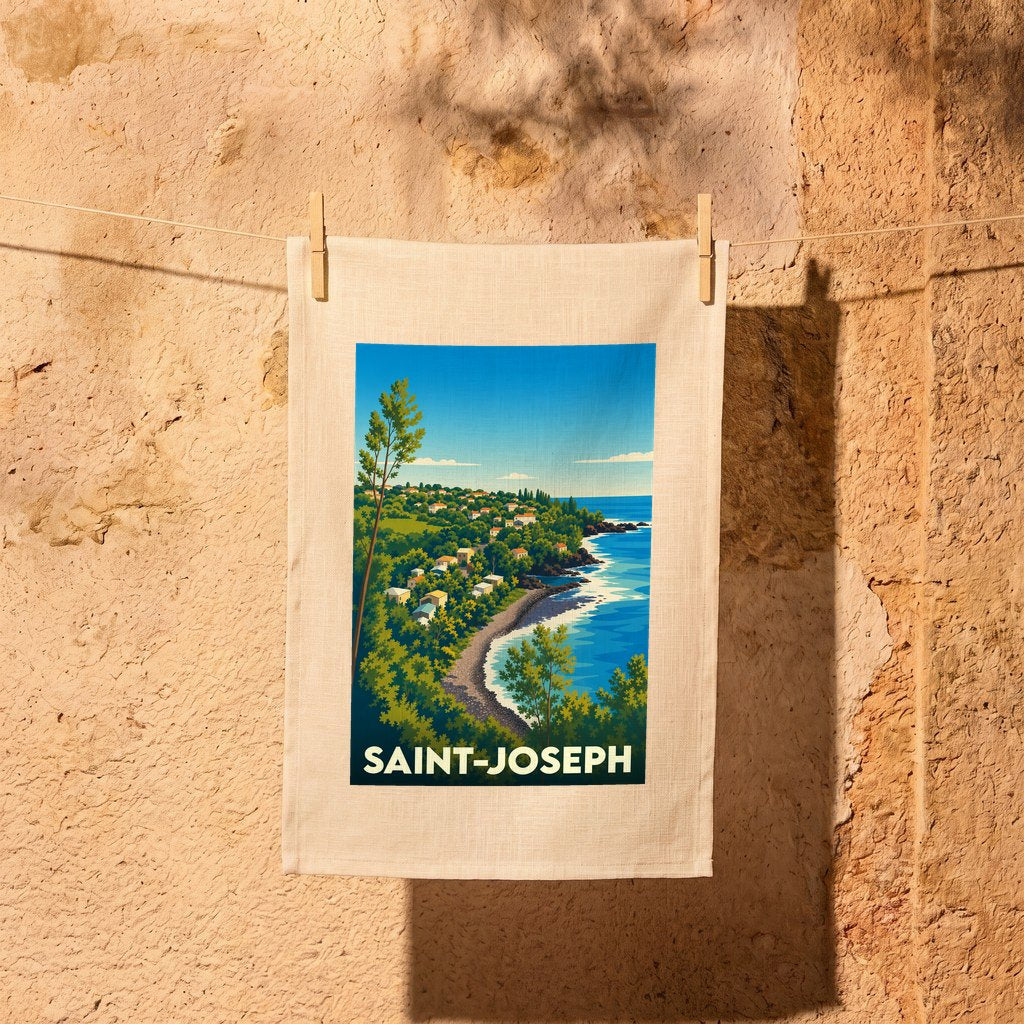 Torchon souvenir de la ville de Saint-Joseph avec une illustration stylisée d'un paysage côtier.