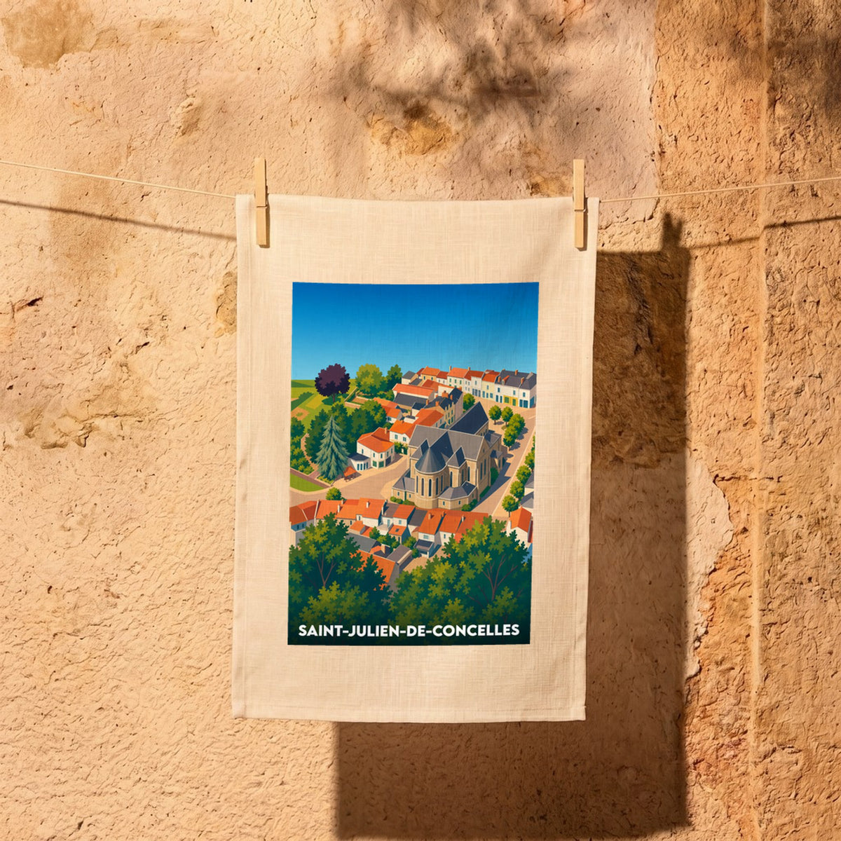Torchon souvenir de la ville de Saint-Julien-de-Concelles avec une illustration stylisée en vue aérienne.