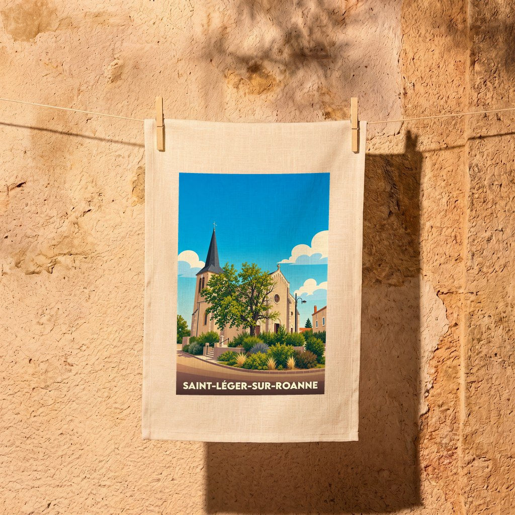 Torchon souvenir de la ville de Saint-Léger-sur-Roanne illustrant un bâtiment historique sous un ciel bleu.