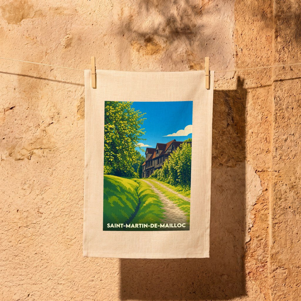 Torchon souvenir de la ville de Saint-Martin-de-Mailloc illustré d'un paysage normand stylisé.